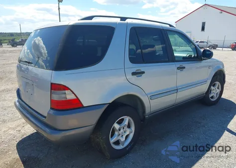 1999 Mercedes-Benz Ml 320 из США, поврежденный, VIN 4JGAB54E0XA097167